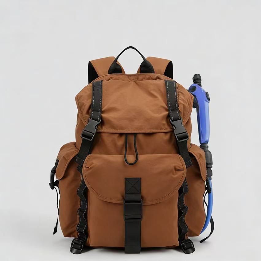 Brown external-power backpack sprayer with blue spray gun