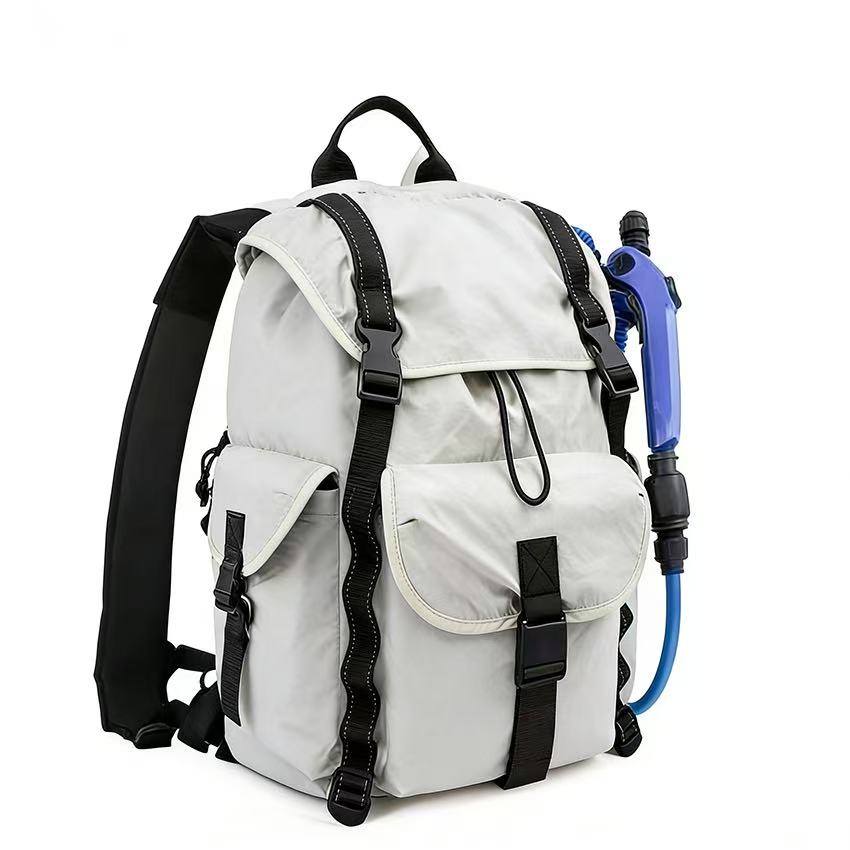 White external-power backpack sprayer with blue spray gun